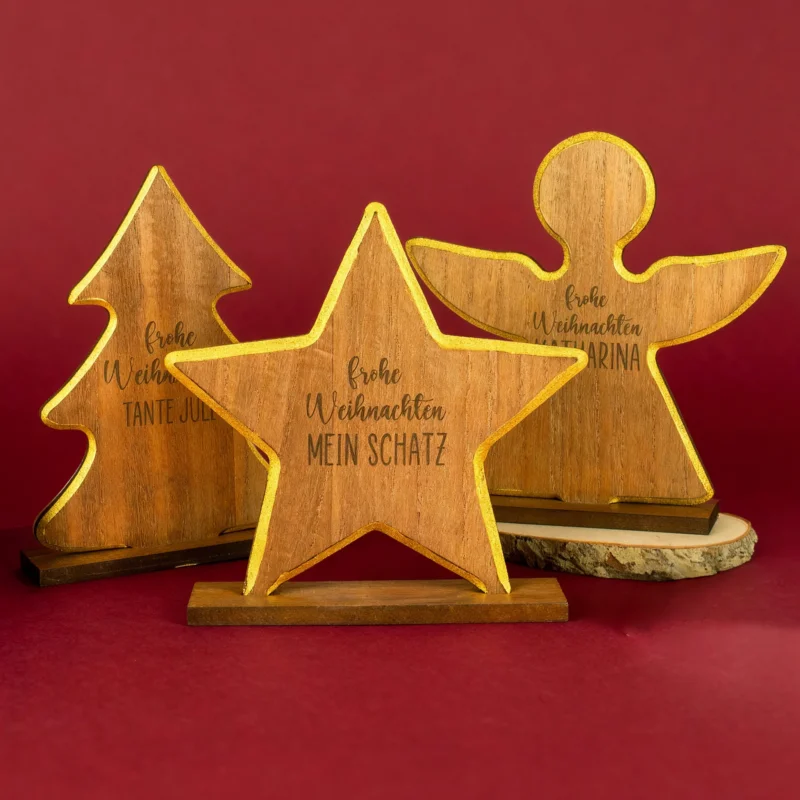 Holzaufsteller mit Gravur Frohe Weihnachten und Wunschtext, in Form von Stern, Engel und Tanne, goldene Kante, festliche Dekoration